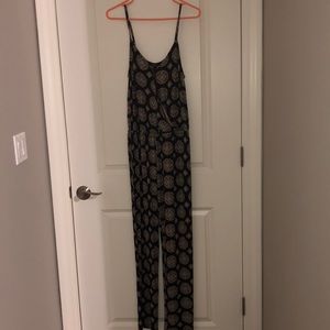 Brand new spaghetti strap jumpsuit w/pockets